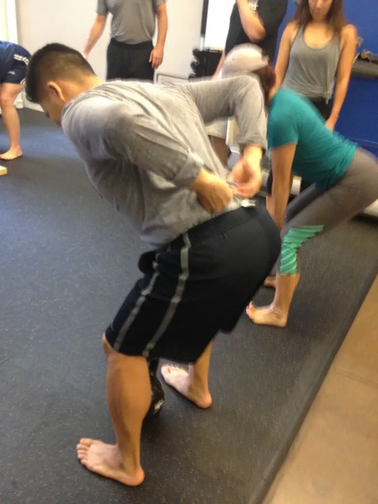 The great Peter Hwang of Reset PT demonstrating the greatest tactile cue for the hip hinge. Pause.